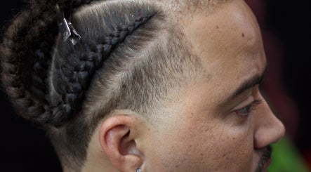 Close-up of braided hairstyle at Rick Blndz, Nassau, New Providence, BS.