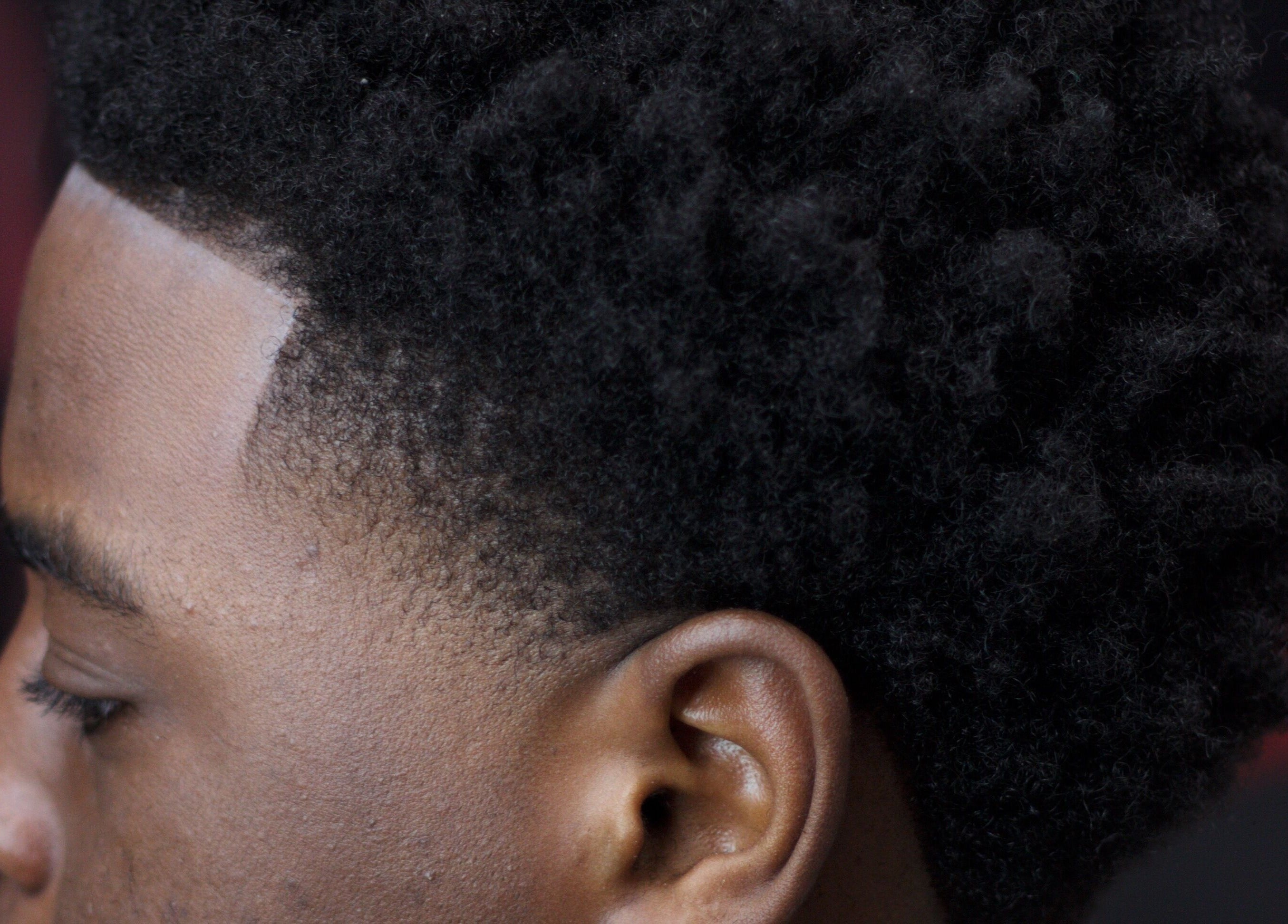 Close-up of a sharp fade haircut at Rick Blndz, Nassau, New Providence, BS.