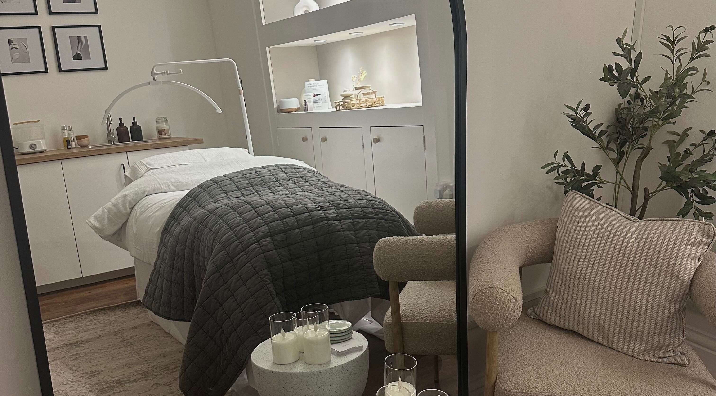 Luxurious treatment room at The Gel Club in Stamford, England, GB with plush bed and calming decor.
