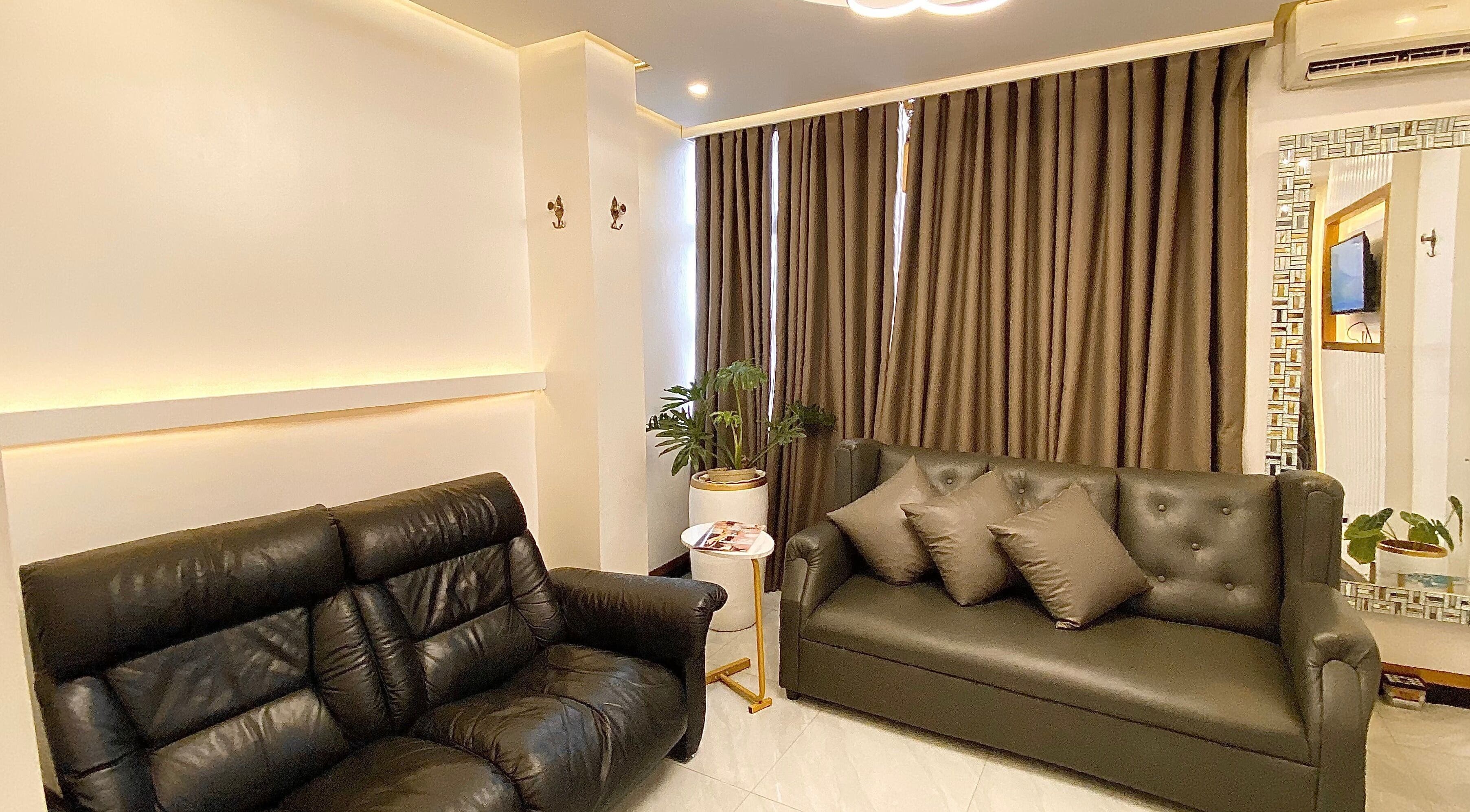 Elegant waiting area with sofas at CLG Aesthetics Marikina, Metro Manila, PH offering tranquil ambiance.