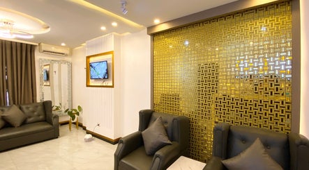 Luxurious interior of CLG Aesthetics Marikina, Metro Manila, PH, featuring elegant seating and gold accents.