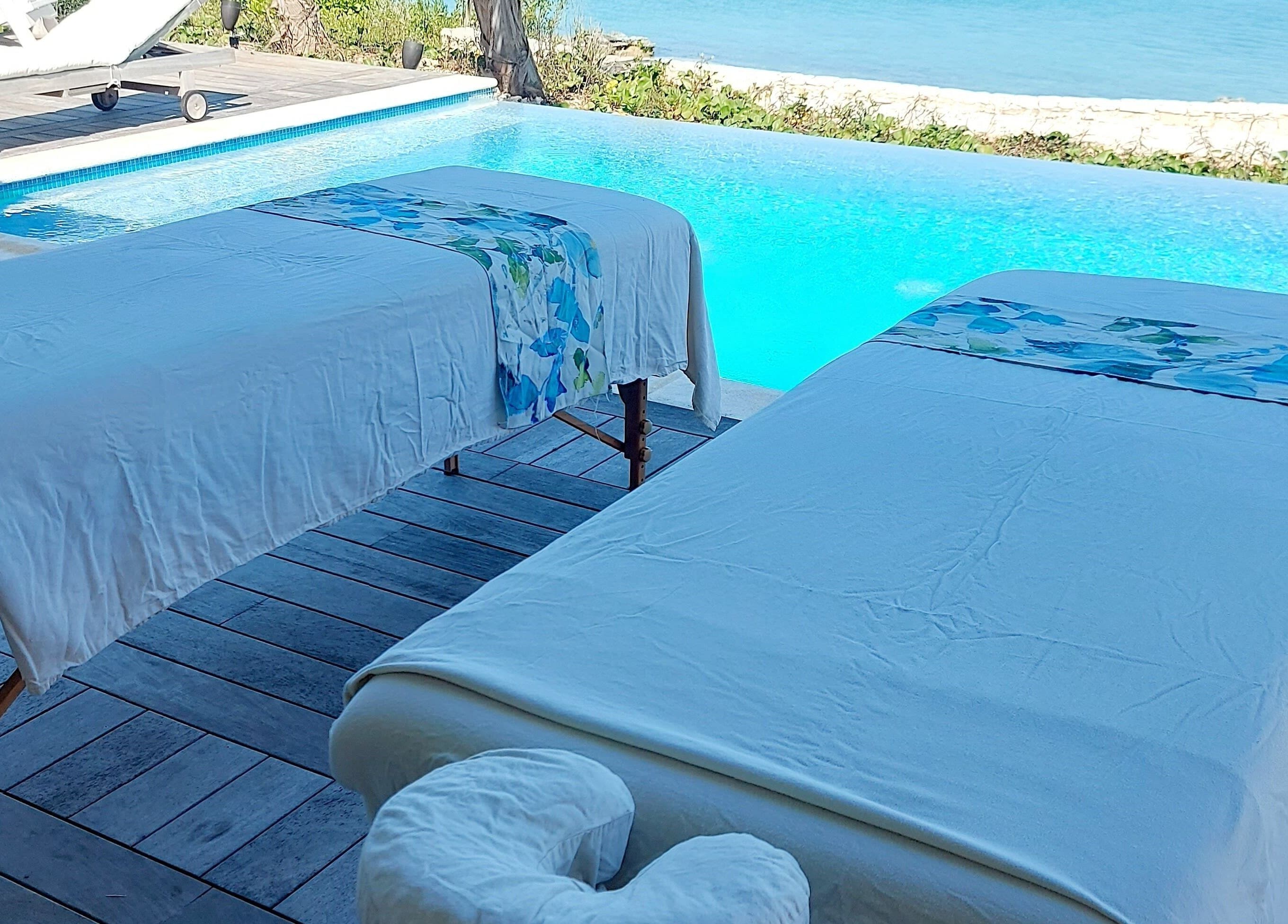 Relaxing poolside massage tables at The Sea View Spa at February Point, Exuma, Exuma, BS.