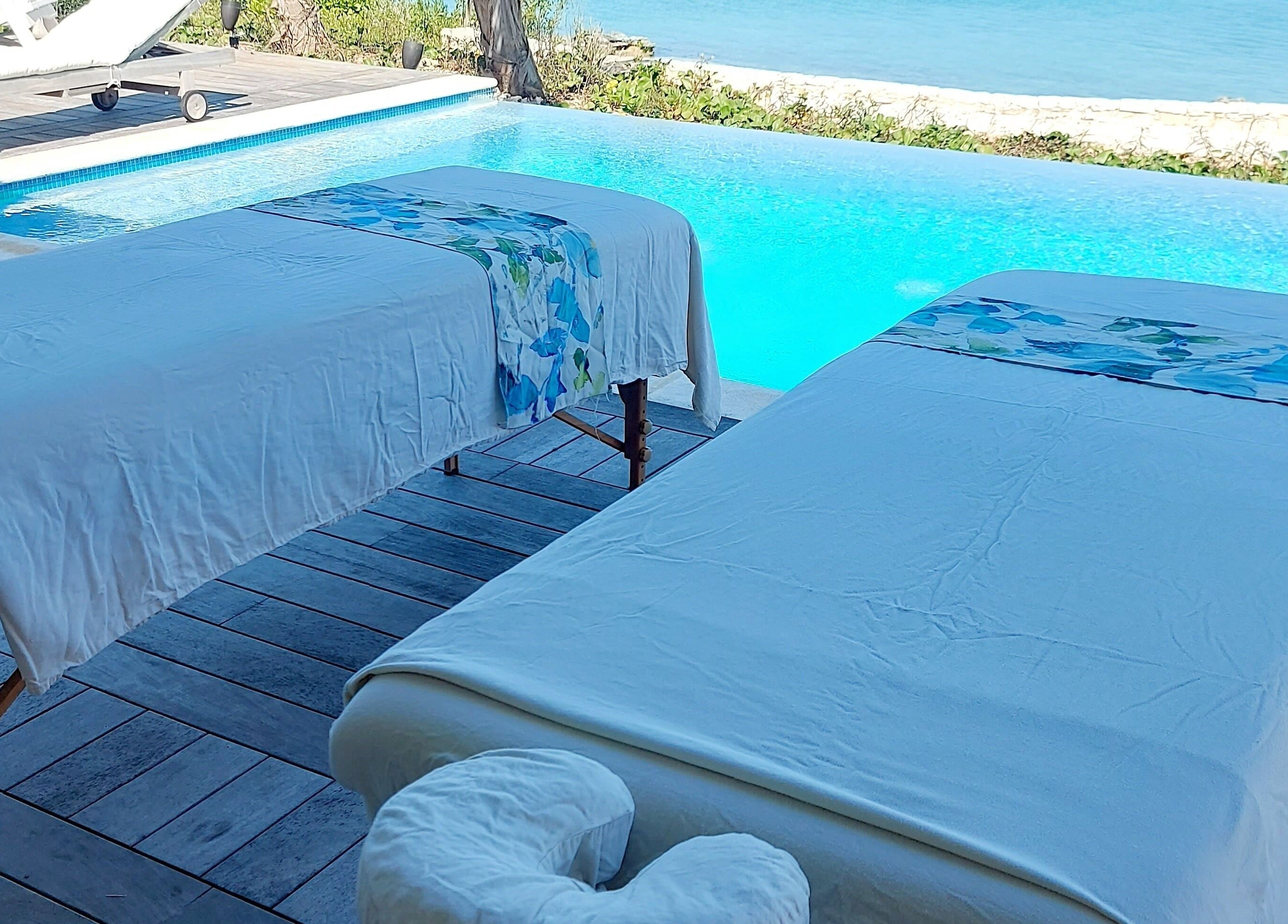 Relaxing poolside massage tables at The Sea View Spa at February Point, Exuma, Exuma, BS.