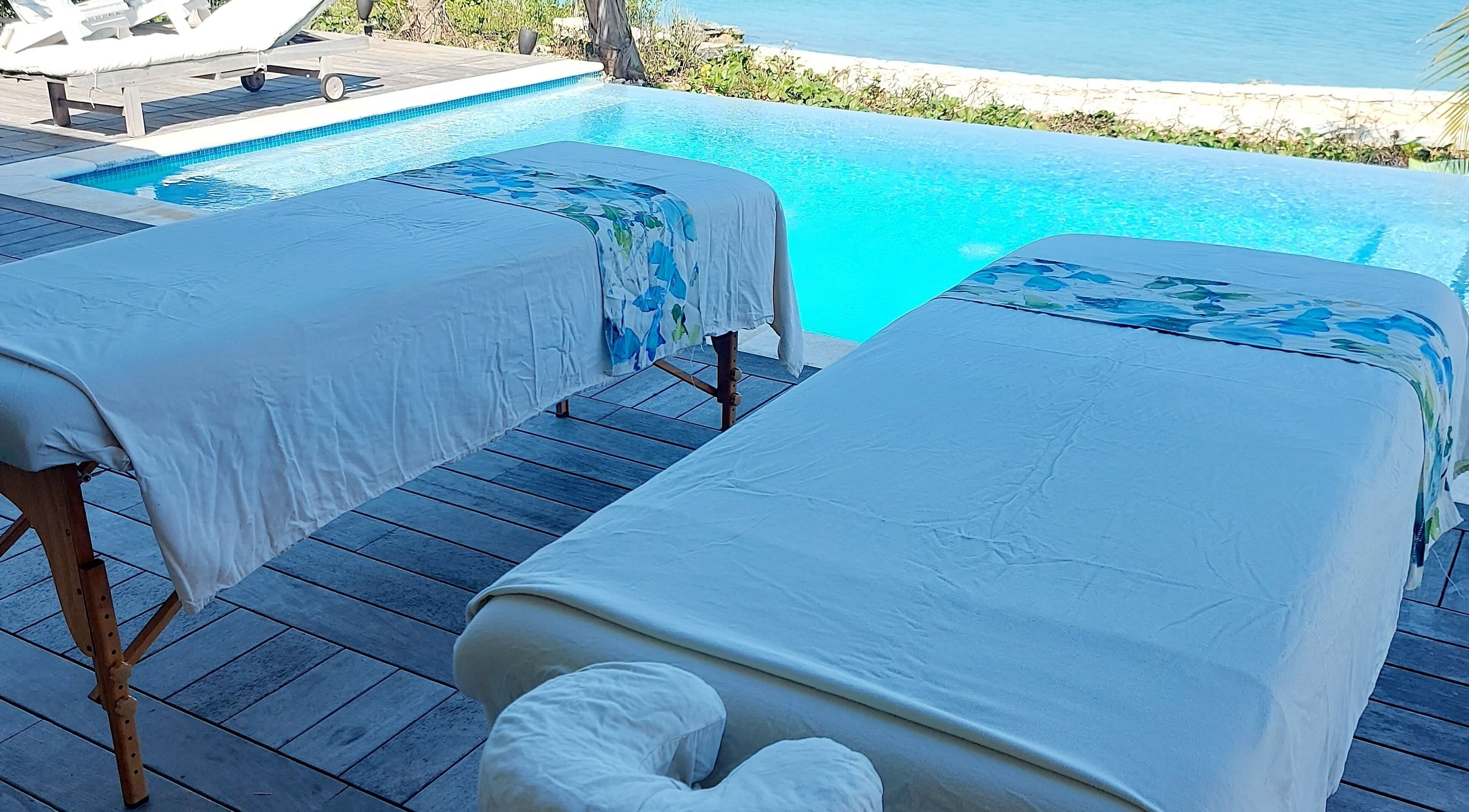 Relaxing poolside massage tables at The Sea View Spa at February Point, Exuma, Exuma, BS.