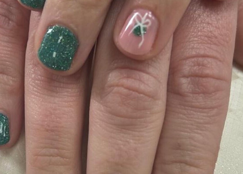 Glittery green nails with detailed design at Synergy Aesthetics Bexley, Bexley, England, GB.