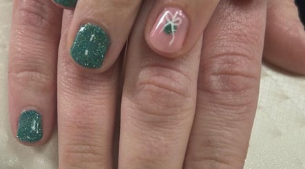 Glittery green nails with detailed design at Synergy Aesthetics Bexley, Bexley, England, GB.