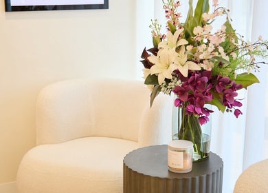 Elegant waiting area with floral decor at The Teeth Whitening Boutique - The Fit Injector Clinic, Bondi Junction, NSW.