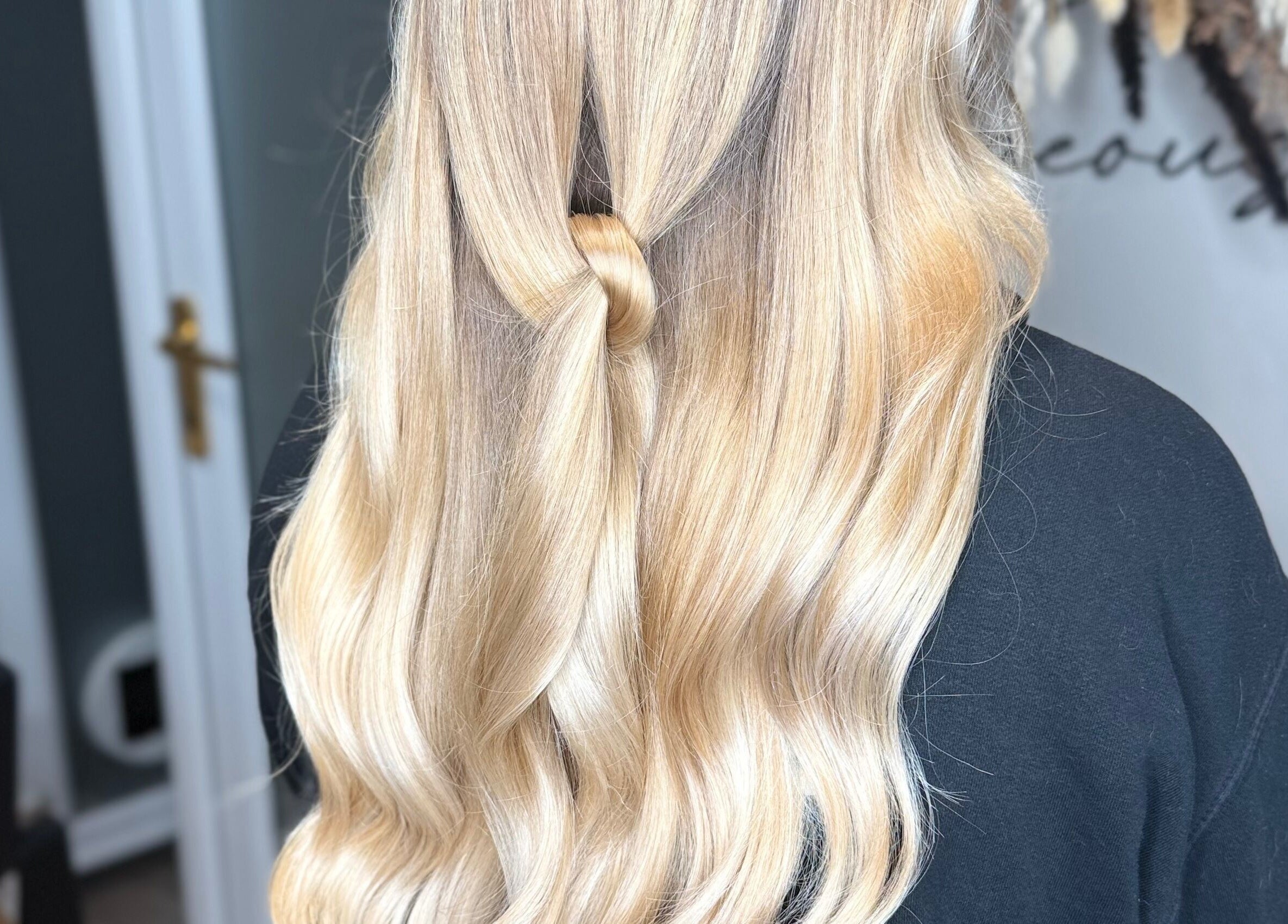 Beautiful blonde waves styled at JR Hair Studio in Walnut Tree, England, GB. Perfectly crafted hairstyle.