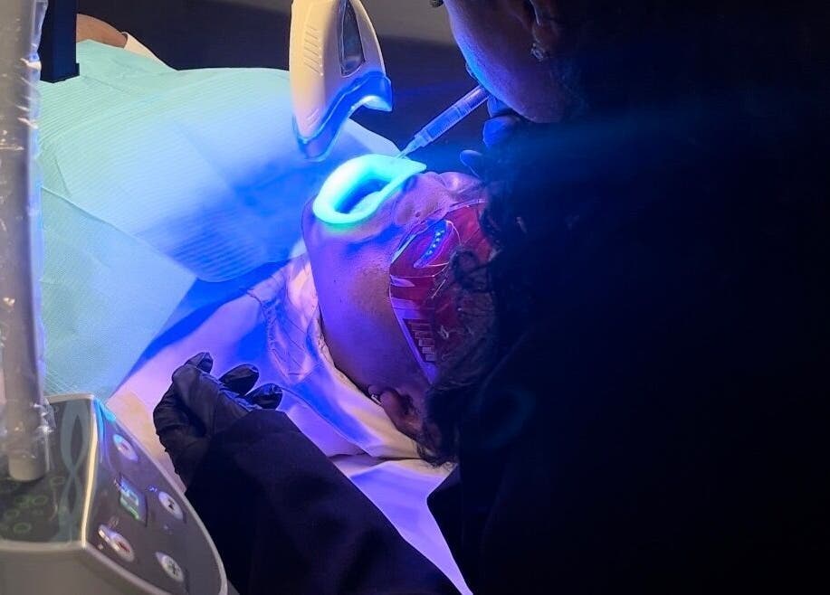 Professional skin treatment with blue light at City Brows London, London, England, GB.
