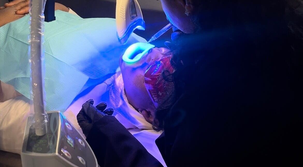 Professional skin treatment with blue light at City Brows London, London, England, GB.