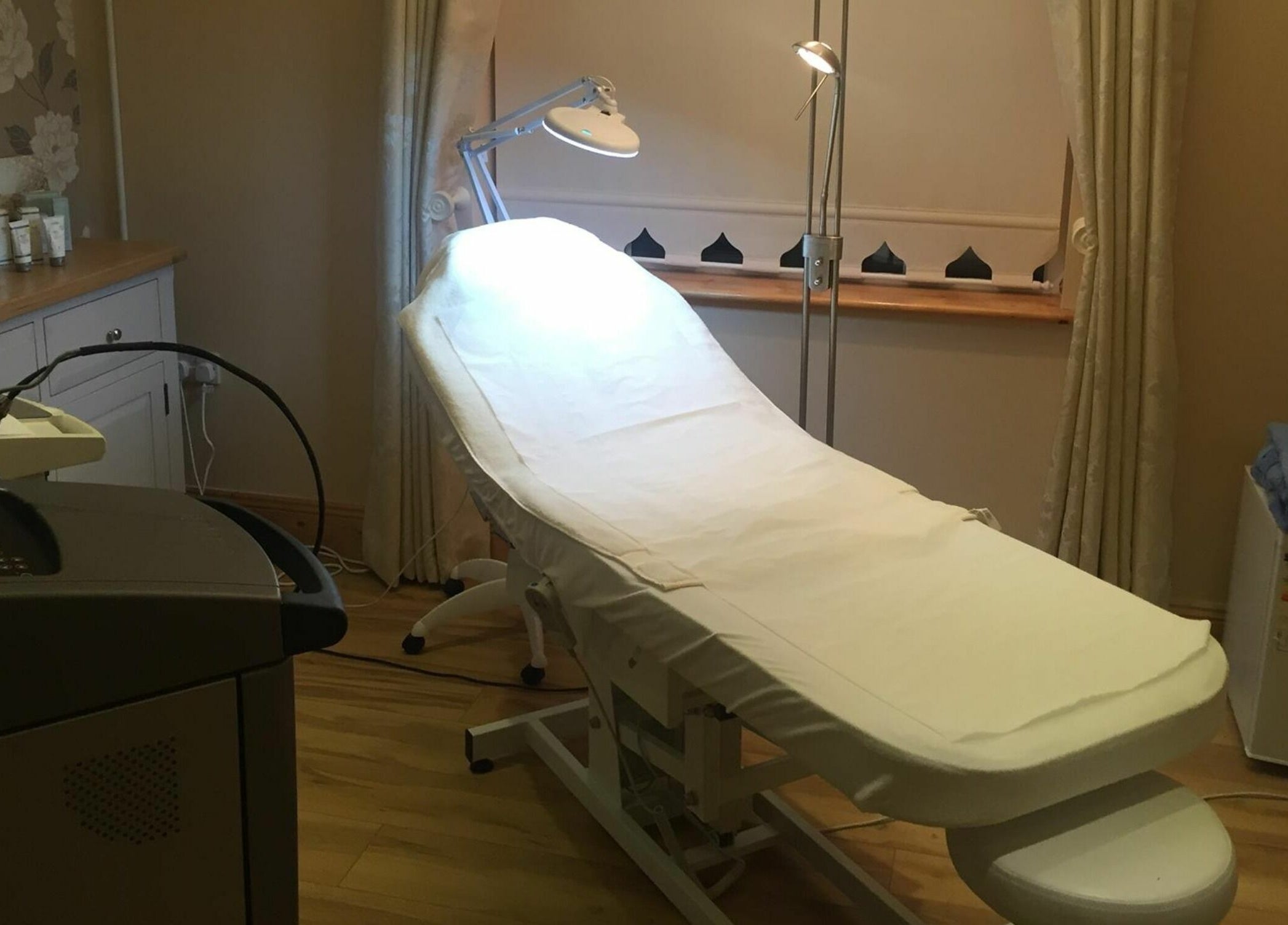 Cosy treatment room at Laser and Skin Studio, Mullingar, County Westmeath, IE, showcasing relaxing spa bed.
