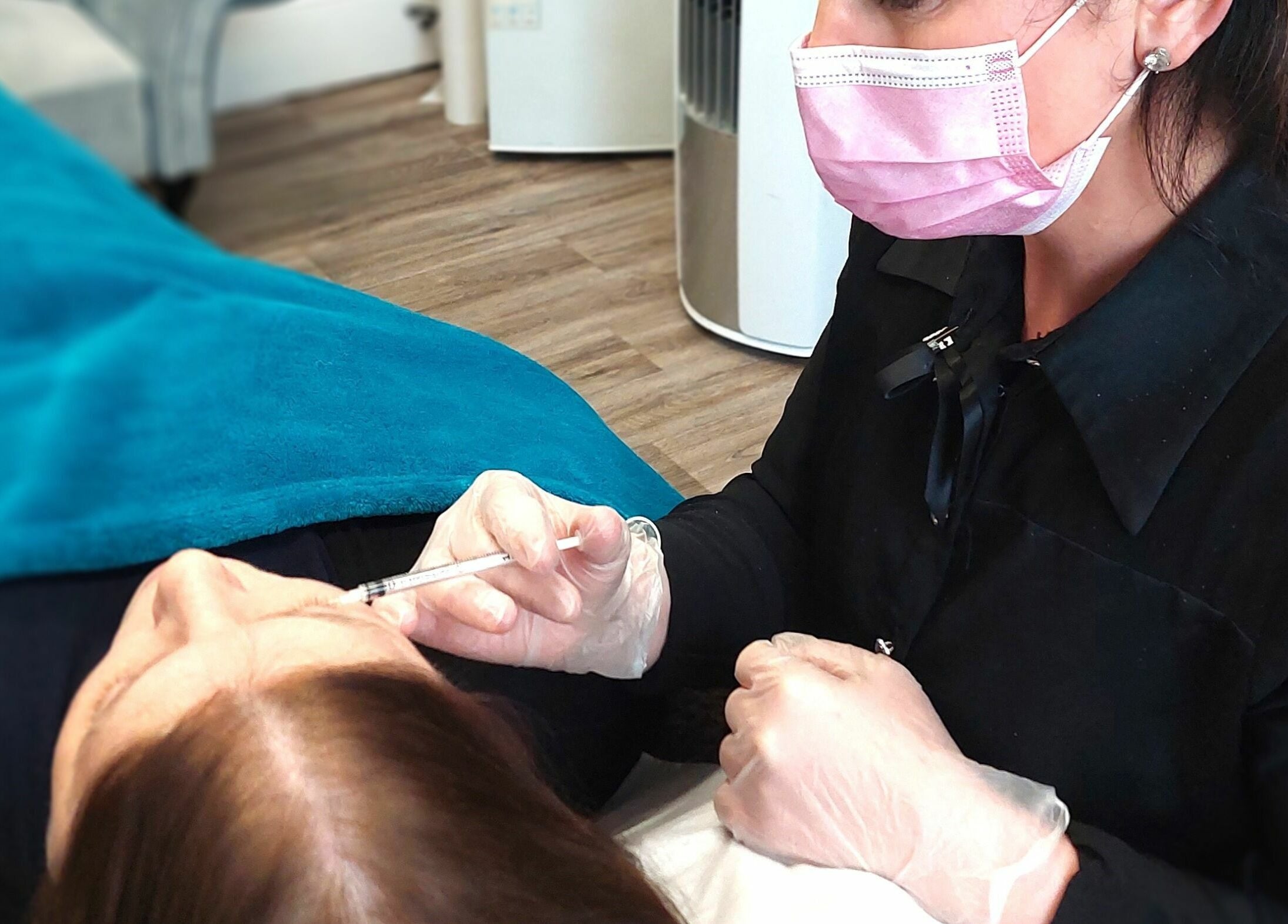 Professional administering treatment at Laser and Skin Studio, Mullingar, County Westmeath, IE.