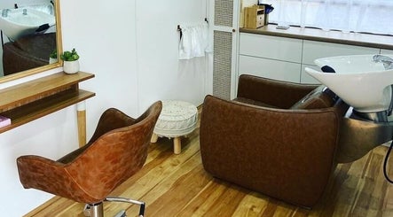 Chic interior of The Organic Hair Van in Bulgarra, Western Australia, featuring modern salon equipment.