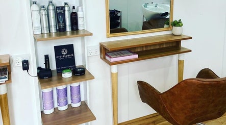 Modern salon interior at The Organic Hair Van, Bulgarra, WA, showcasing eco-friendly hair products and decor.