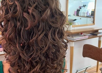 Luxurious curly hairstyle at The Organic Hair Van, Bulgarra, Western Australia, AU.