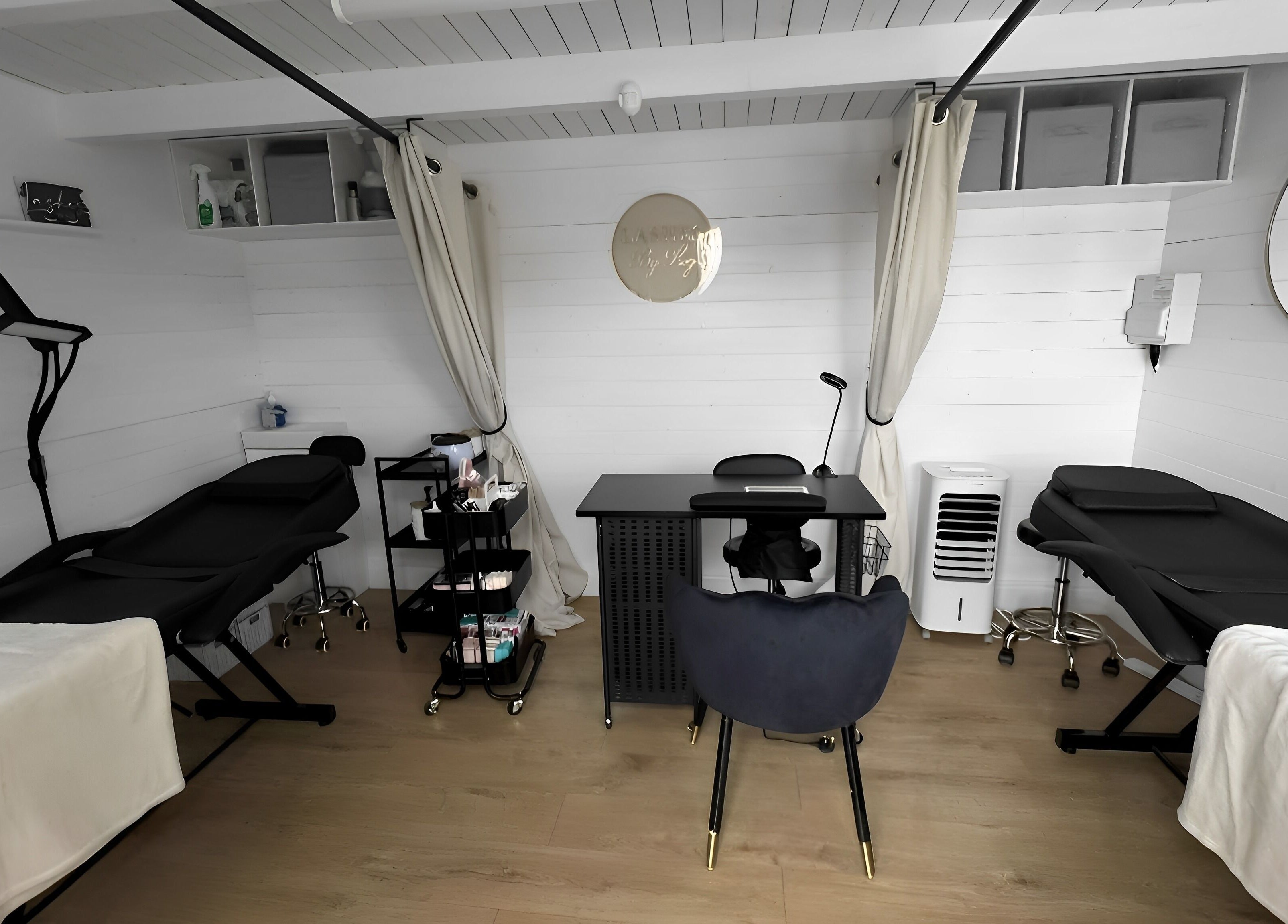 Elegant studio interior at Lashes by Loz LTD, Langdon Hills, England, GB, showcasing a tranquil beauty setup.