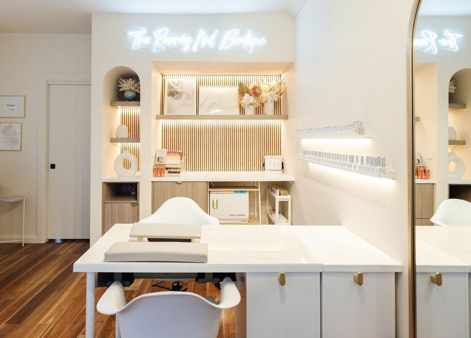 Stylish interior of Nails with Mimi in Earlwood, New South Wales, AU, showcasing sleek nail stations and decor.