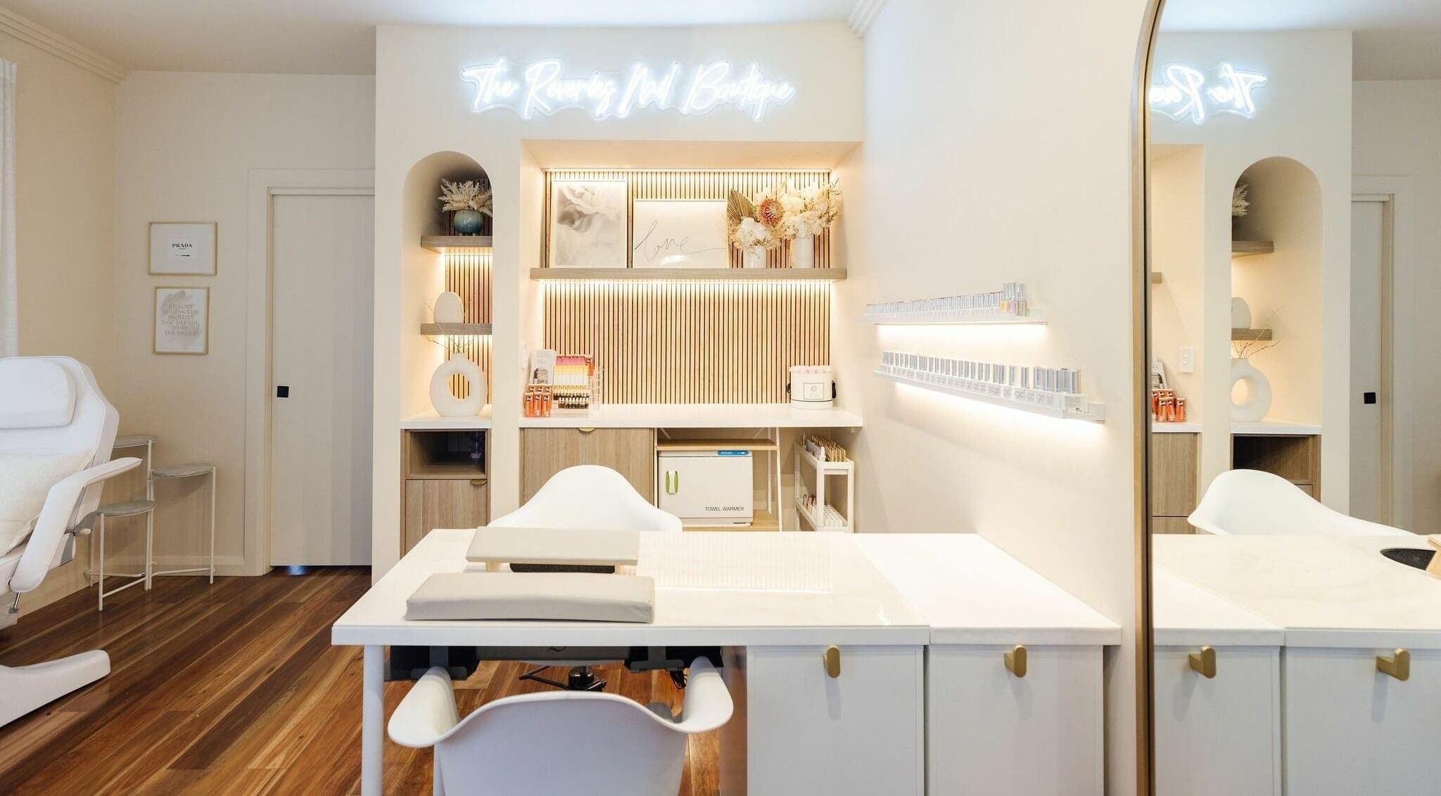 Stylish interior of Nails with Mimi in Earlwood, New South Wales, AU, showcasing sleek nail stations and decor.
