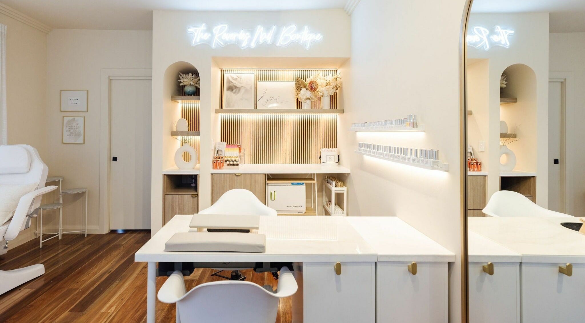 Stylish interior of Nails with Mimi in Earlwood, New South Wales, AU, showcasing sleek nail stations and decor.
