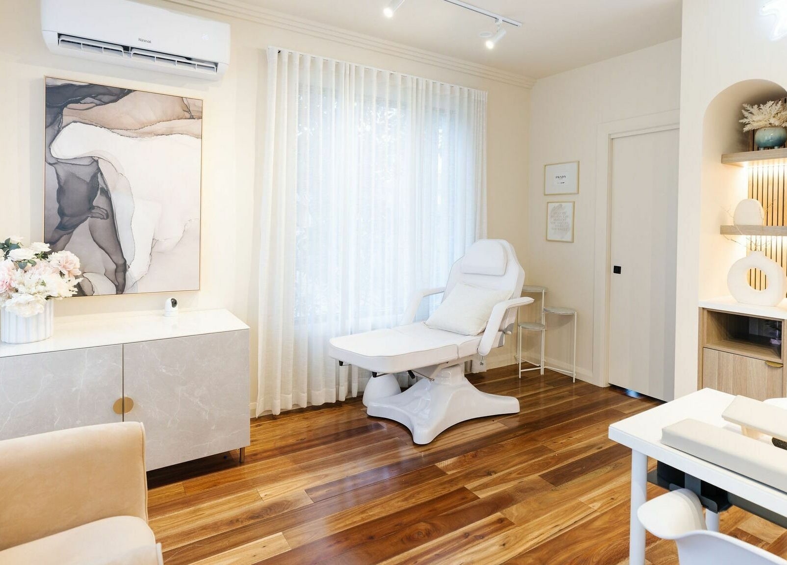 Chic salon interior at Nails with Mimi, Earlwood, New South Wales, AU showcasing a modern decor and treatment chair.