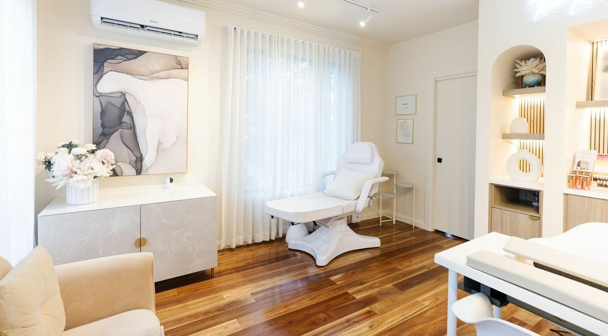 Chic salon interior at Nails with Mimi, Earlwood, New South Wales, AU showcasing a modern decor and treatment chair.