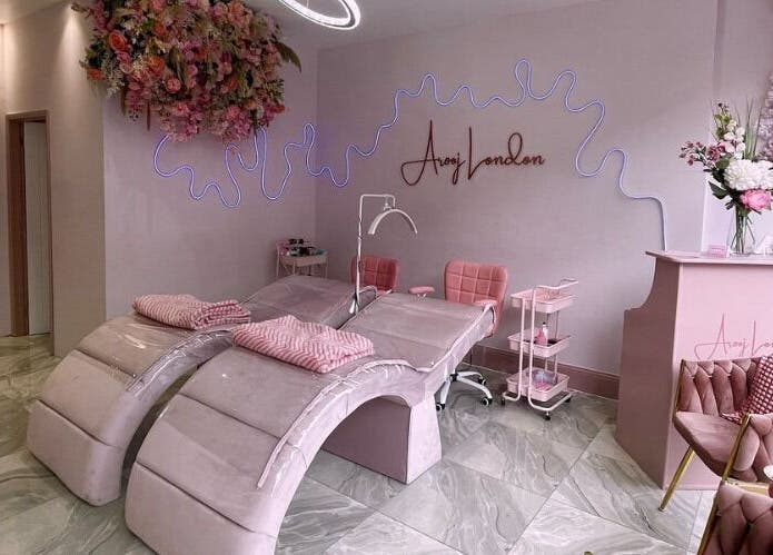 Elegant wellness interiors at Arooj London, London, England, GB, showcasing modern spa chairs and chic decor.