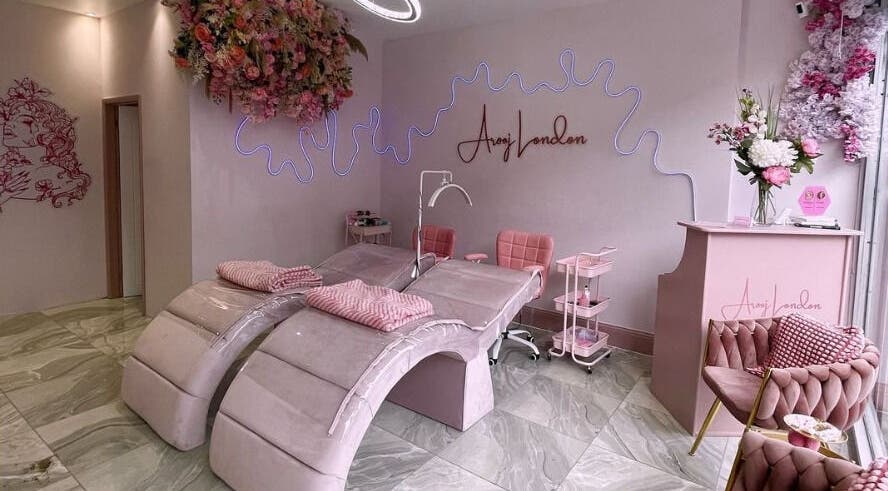 Elegant wellness interiors at Arooj London, London, England, GB, showcasing modern spa chairs and chic decor.