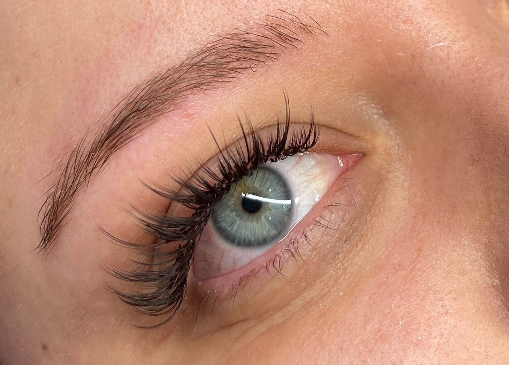 Close-up of eye with elegant eyelash extensions at Arooj London, London, England, GB.
