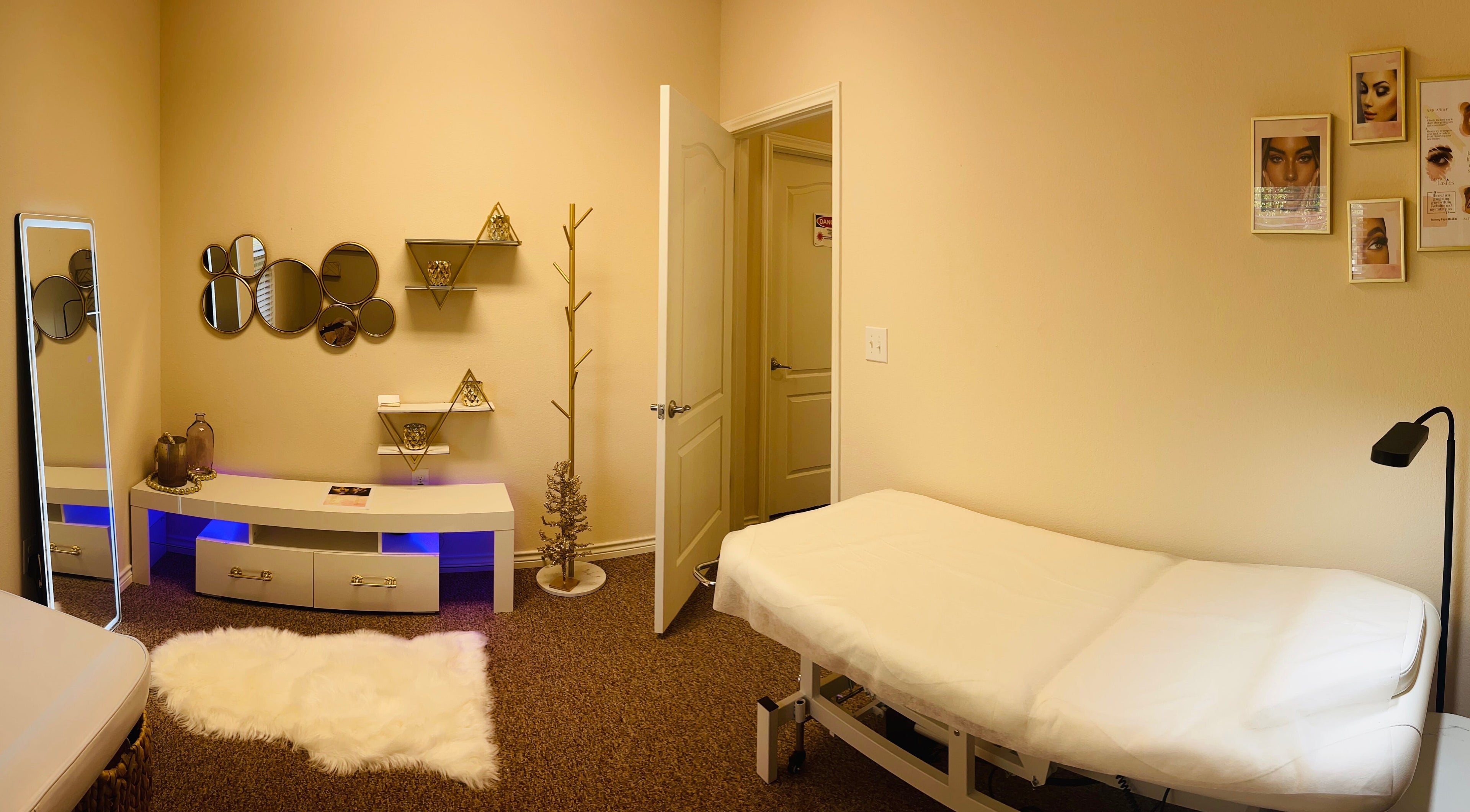 Tranquil room at La Belleza Lash Studio, Cedar Park, Texas, US featuring a cozy massage bed and stylish decor.