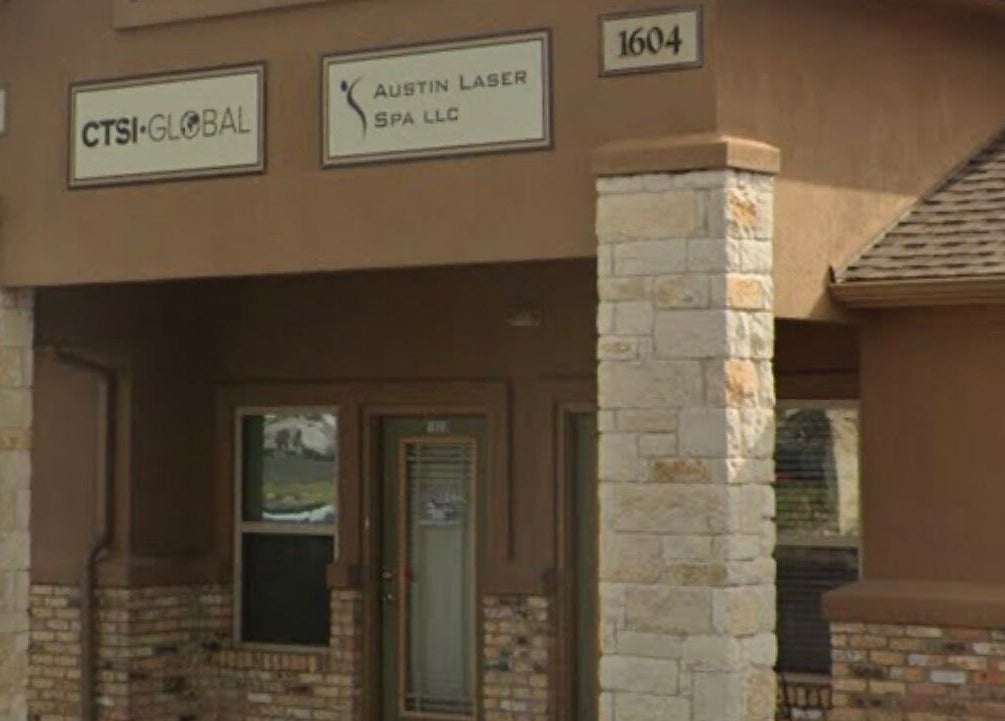 Front view of La Belleza Lash Studio with brown stone design in Cedar Park, Texas, US.