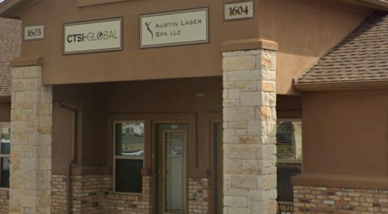 Front view of La Belleza Lash Studio with brown stone design in Cedar Park, Texas, US.