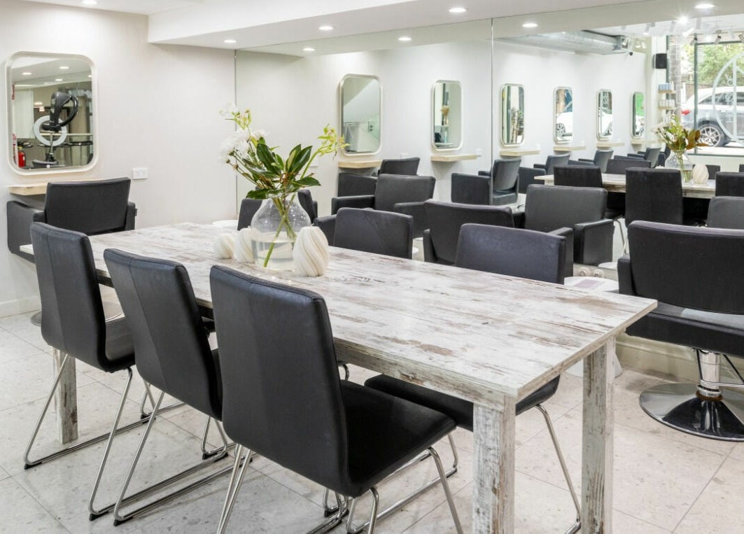 Stylish salon chairs and mirrors at House of Lox Neutral Bay, located in Neutral Bay, New South Wales, AU.