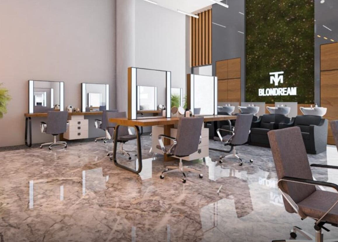 Spacious interior of The Most Hair Design Ladies Salon in Dubai, Dubai, AE with stylish workstations and chairs.