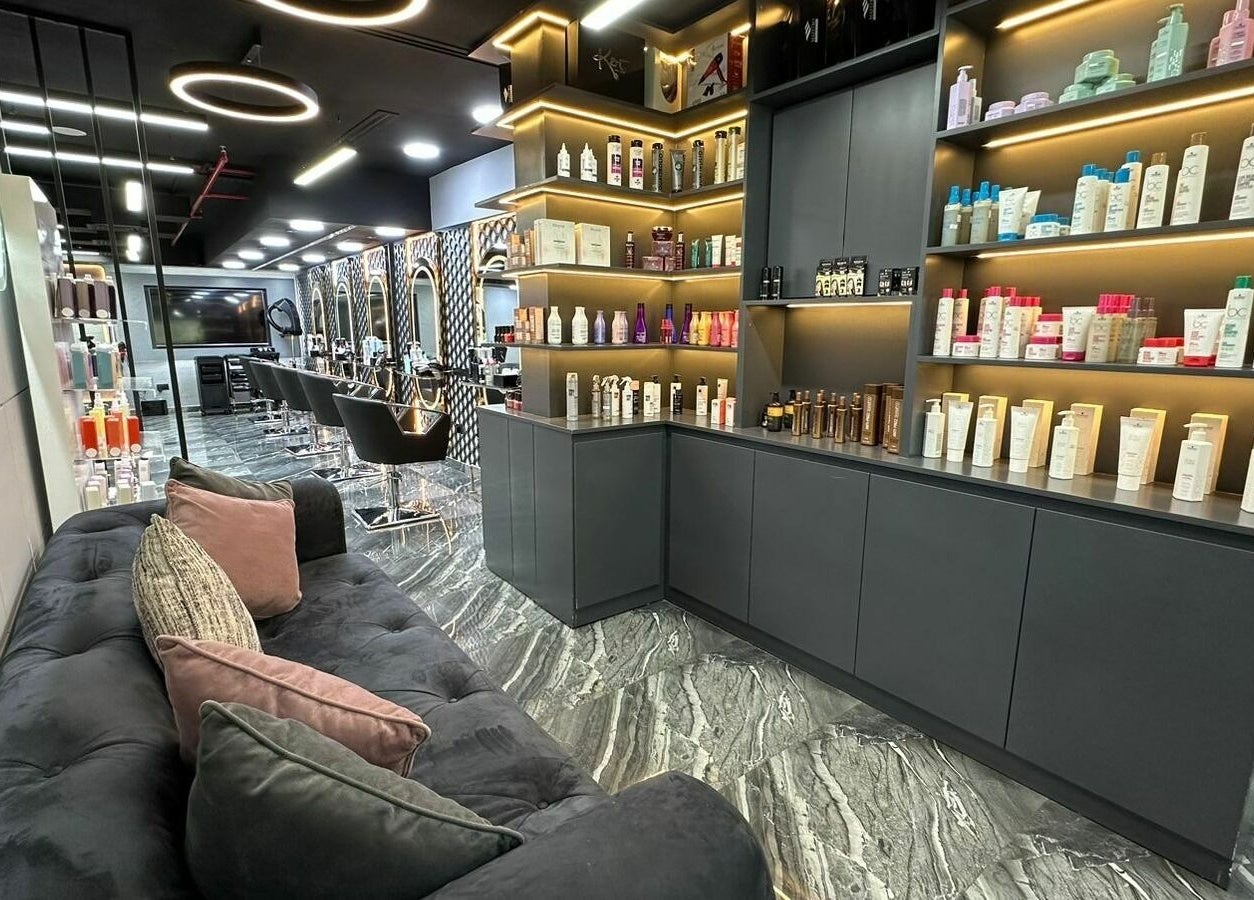 Elegant interior of Noor Beauty Salon | Beach Rotana featuring products and seating, Abu Dhabi, AE.