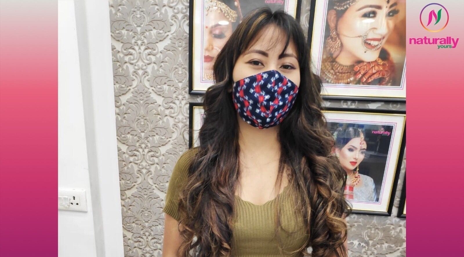Client at Naturally Yours Salon in Navi Mumbai, Maharashtra, IN, wearing a mask and styled with curled hair.