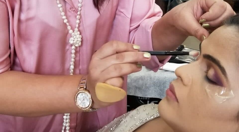 Professional makeup application at Naturally Yours Salon in Navi Mumbai, Maharashtra, IN.