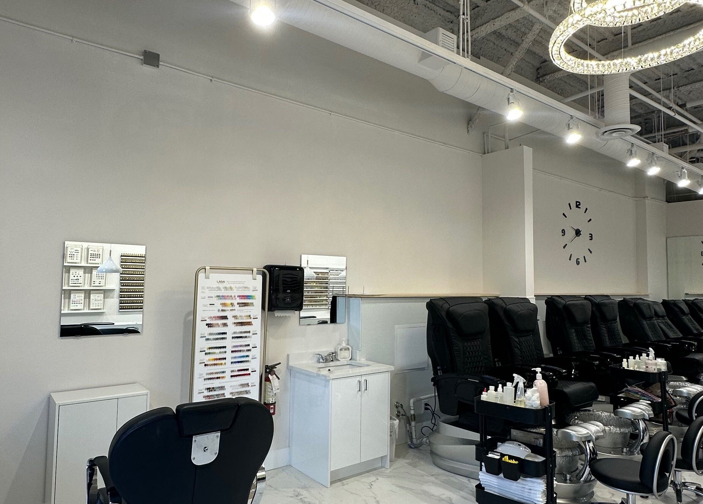 Spacious nail salon at Creative Nails and Esthetics in Burnaby, BC, CA, featuring modern pedicure chairs.