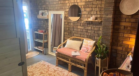 Inviting lounge at Sunset Salt Therapy, Sunset Beach, Western Australia, AU, featuring rustic decor and warm ambiance.