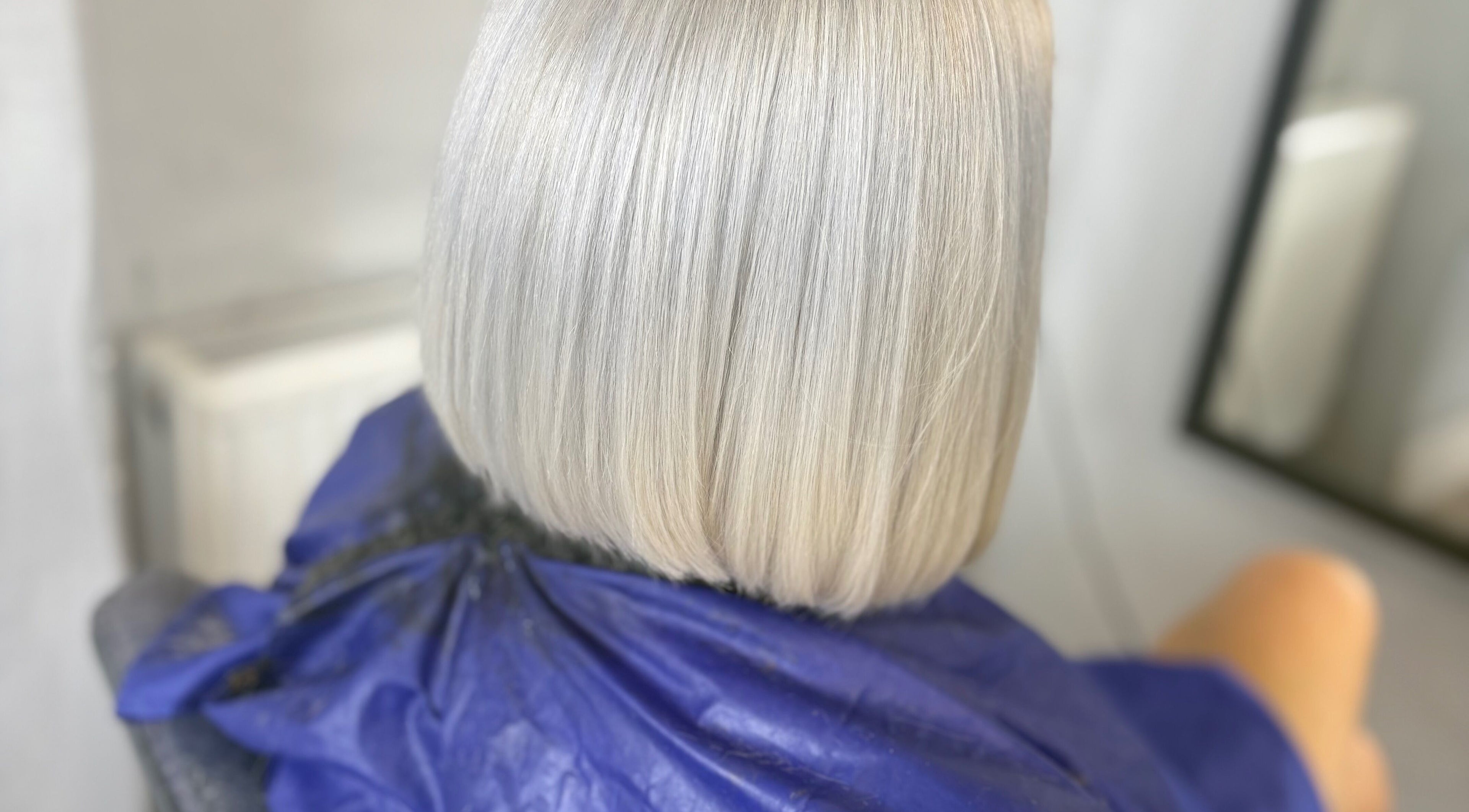 Elegant silver bob hairstyle at Adeva Hairdressing Whaley Bridge, located in Whaley Bridge, England, GB.