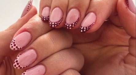 Elegant pink nails with dotted tips at All Things Beauty by Sammy, Stoke-on-Trent, England, GB.