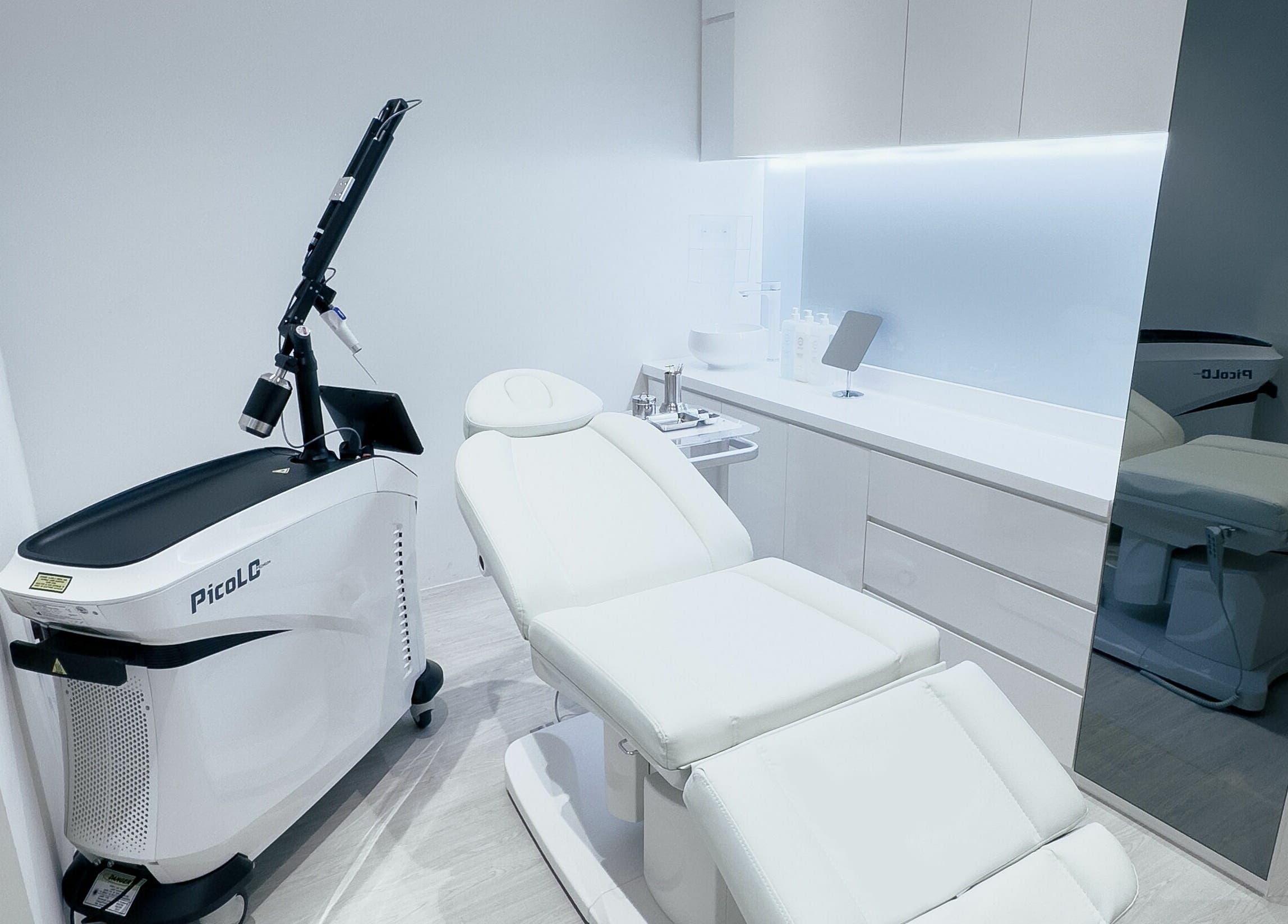 Modern treatment room at Cheongdam, Jurong Point, Singapore, SG with advanced laser equipment.