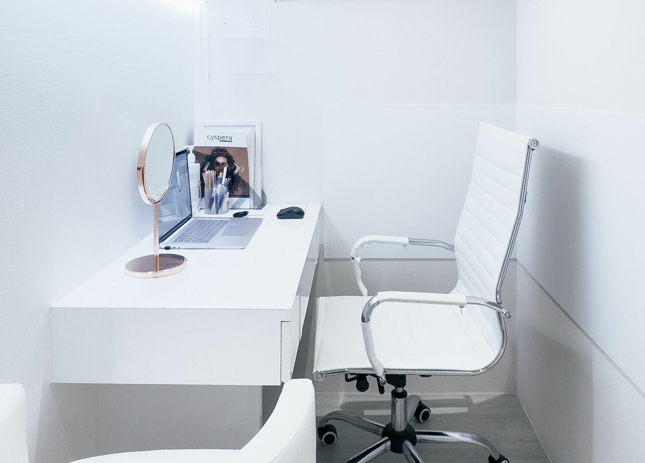 Minimalist beauty station at Cheongdam, Jurong Point, Singapore, SG with white chair and desk.