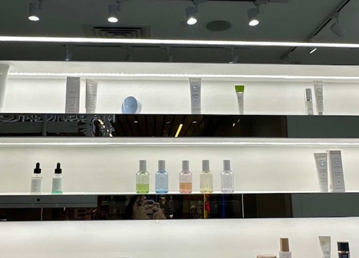 Product display shelf at Cheongdam - SingPost Centre, Singapore, Singapore, SG showcasing beauty items.