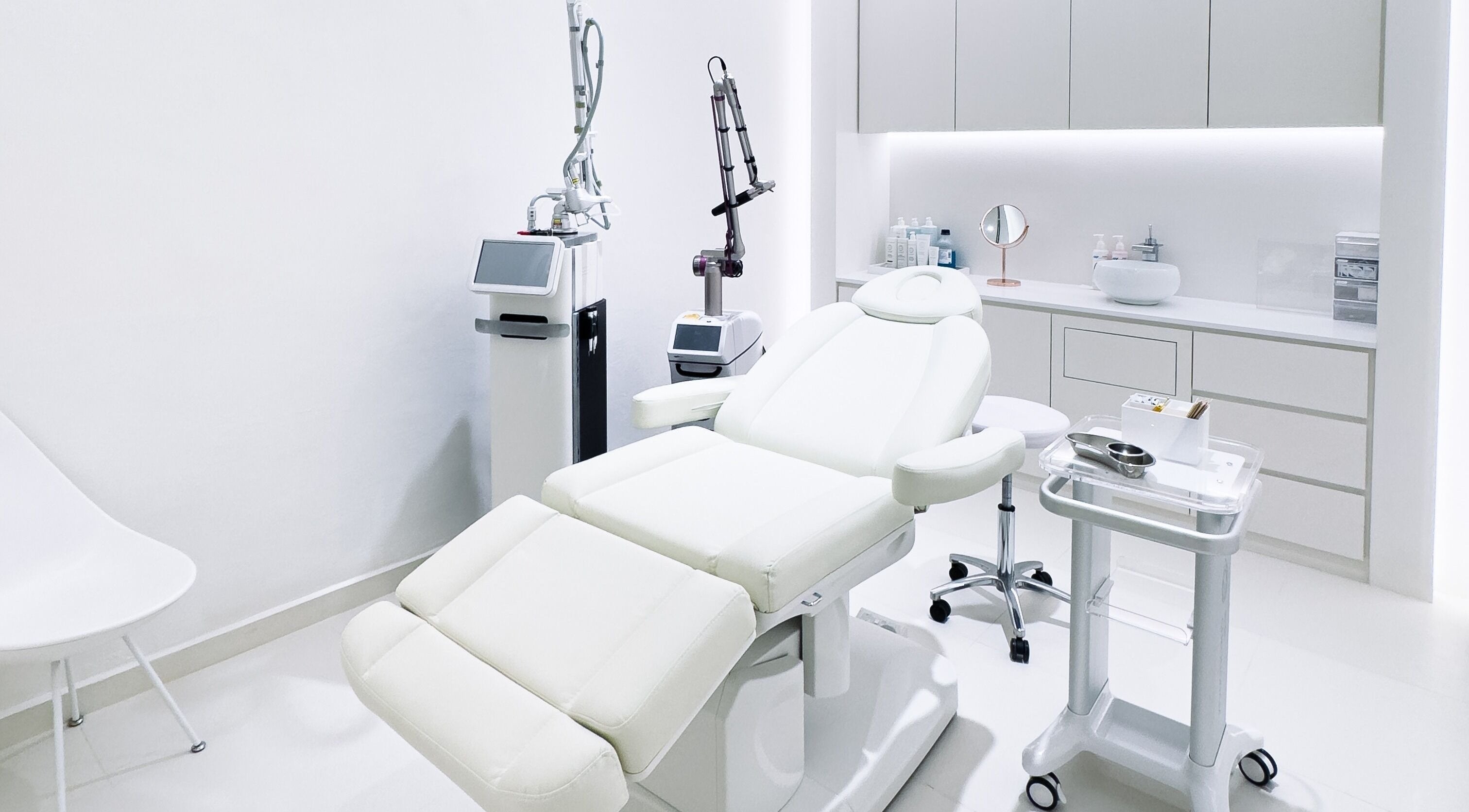 Modern treatment room at Cheongdam, United Square, Singapore, Singapore, SG with advanced equipment and plush chair.