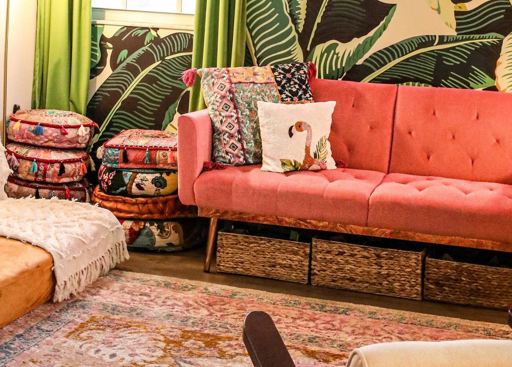 Cozy bohemian lounge area at ASHI Bodywork, Stuart, Florida, US with colorful cushions and vibrant decor.
