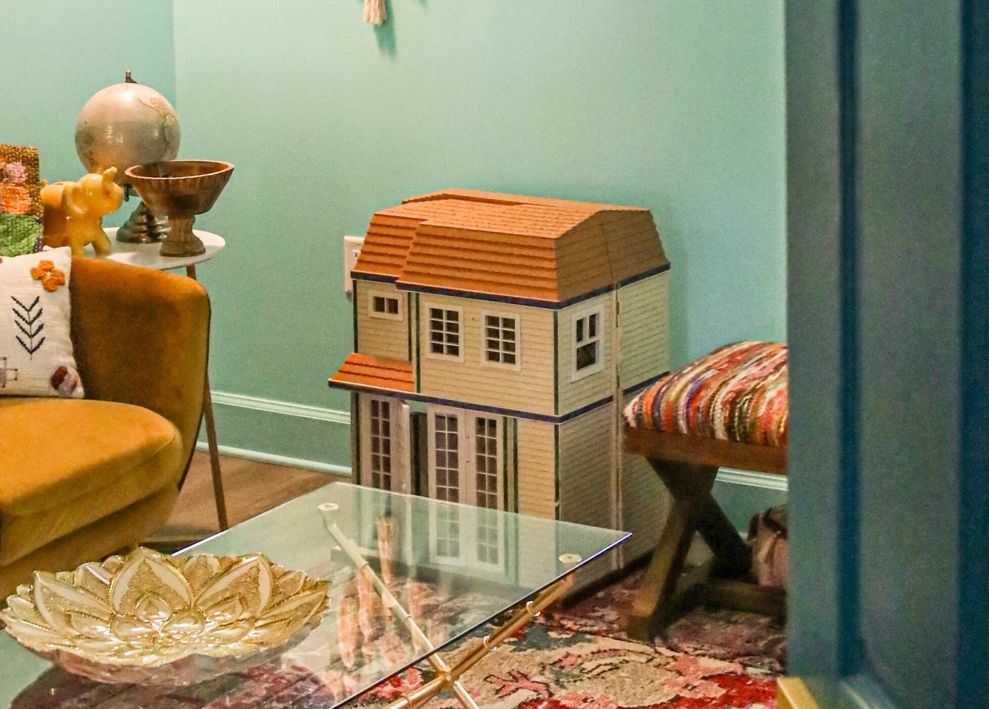 Cozy retro lounge at ASHI Bodywork, Stuart, Florida. Features vintage decor and unique furnishings.