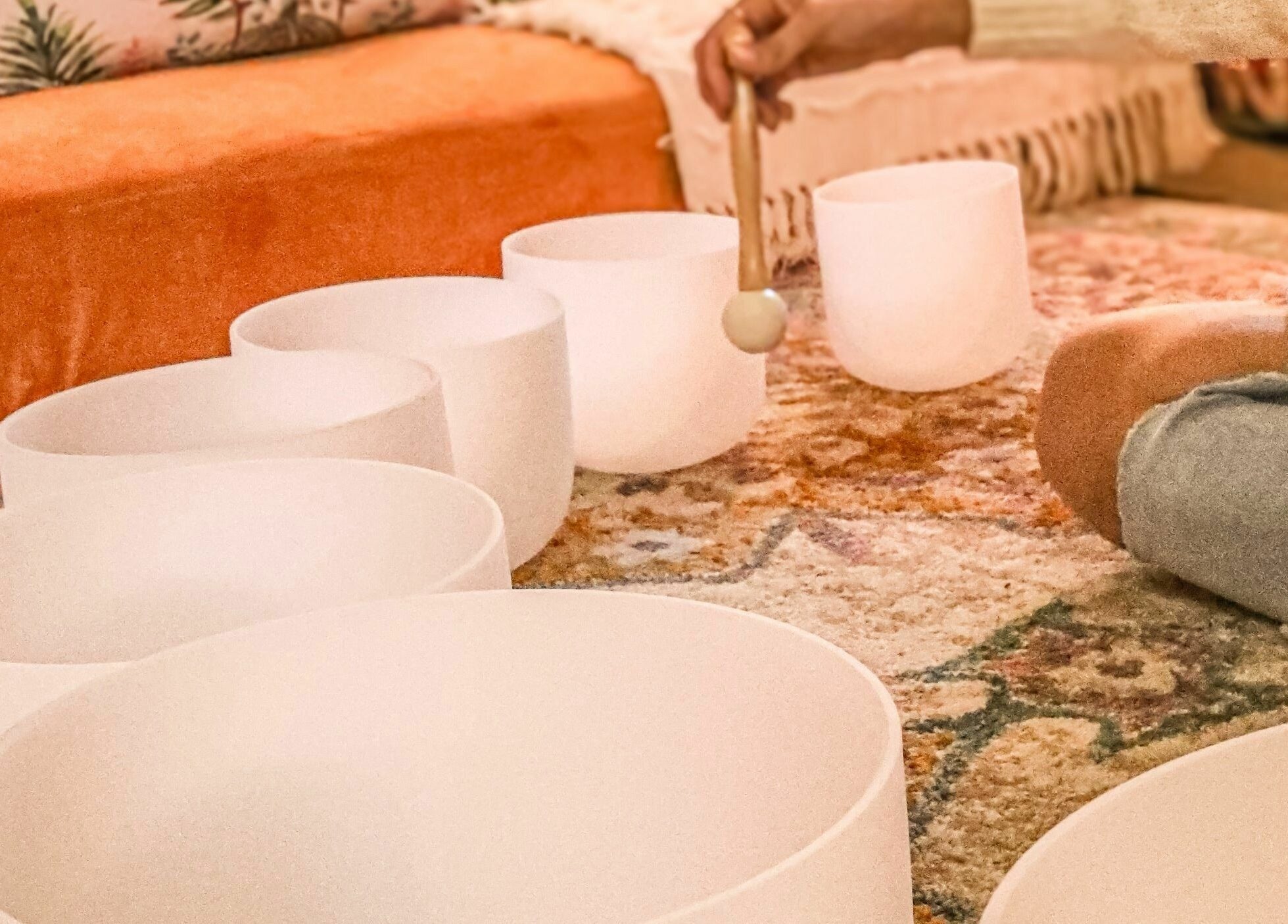 Sound healing bowls at ASHI Bodywork, Stuart, Florida, US create calming wellness atmosphere.