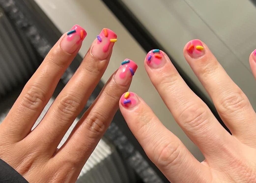 Colorful nail art with sprinkles at KTF Studios, Cardiff, Wales, GB.