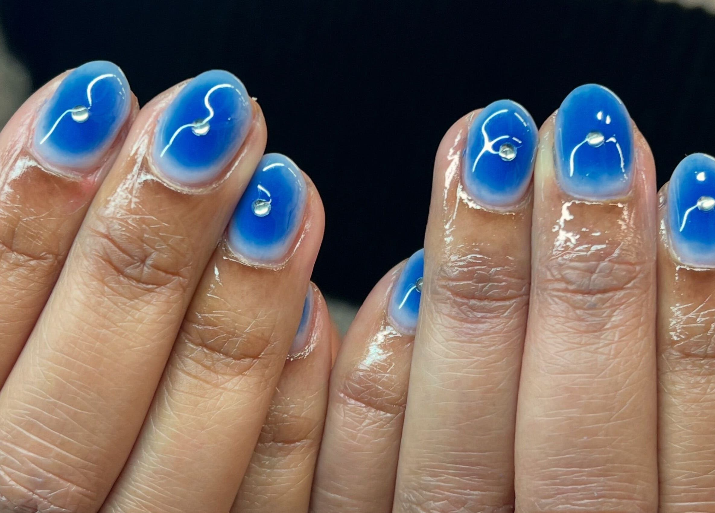 Elegant blue ombre nails with gems at KTF Studios, Cardiff, Wales, GB.