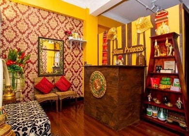 Elegant interior of Siam Princess Thai Massage - Dymocks Building, Sydney, New South Wales, AU, with warm decor.